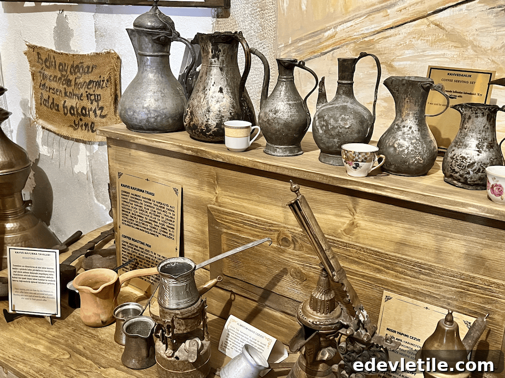 Rustic wooden shelf showcasing antique coffee pots, cezves, and serving jugs, alongside vintage espresso cups and informative museum placards.