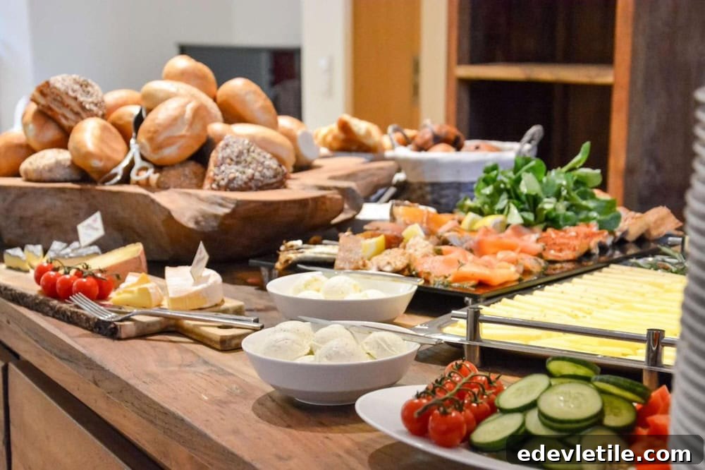 Delicious Turkish-style hotel breakfast buffet with fresh bread, cheeses, vegetables, and cold cuts, served near IST.