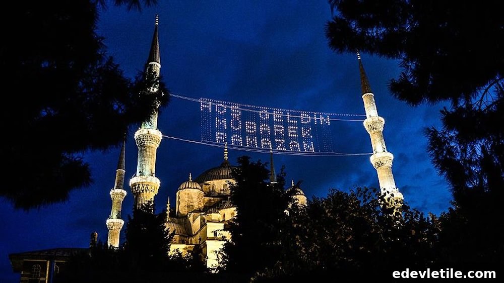 The Blue Mosque in Istanbul is lit up at night during Ramadan, with the message “Hoş geldin mübarek Ramazan” strung between its minarets.