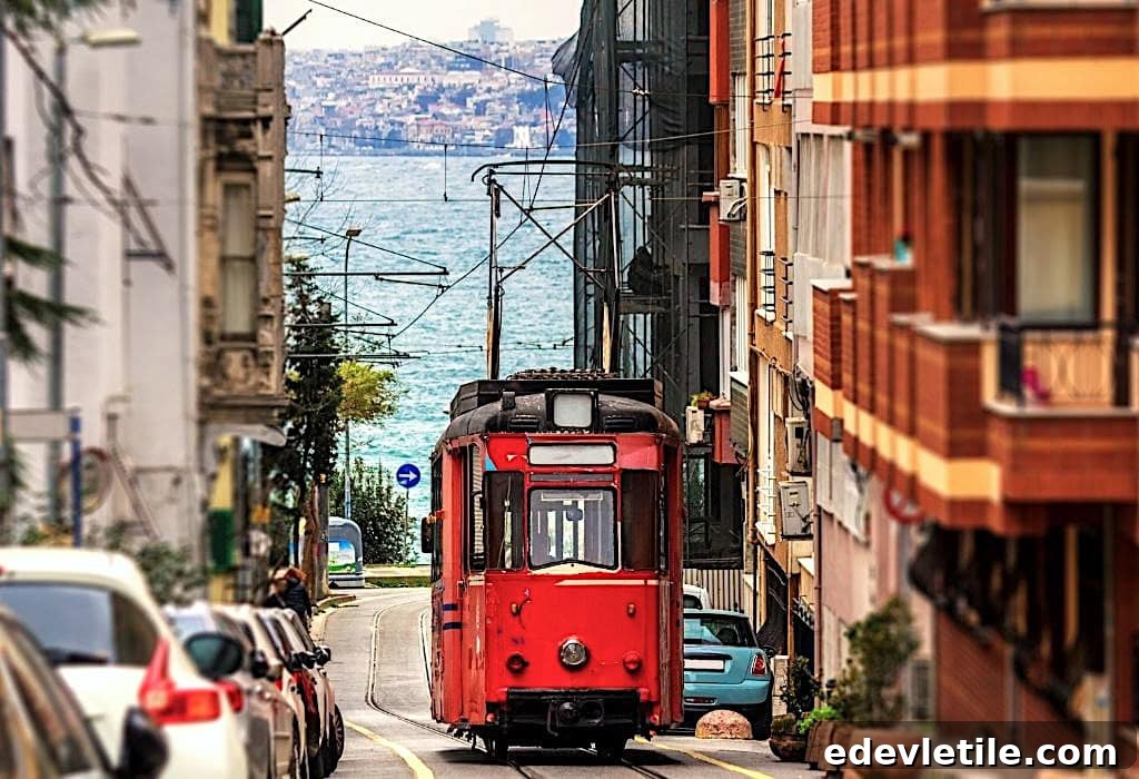 Historic red tram on a narrow street in Istanbul’s Asian Side.