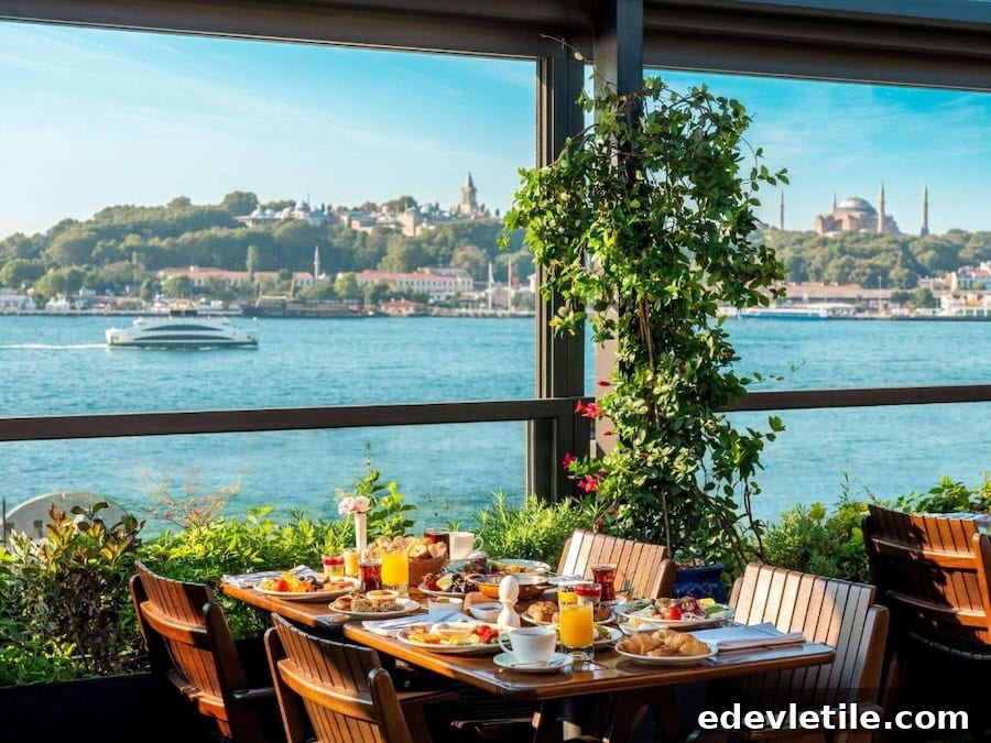 Rooftop breakfast setup at Novotel Istanbul Bosphorus with a panoramic view of the Bosphorus, Hagia Sophia, and historic Istanbul skyline.