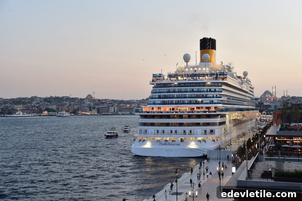 Large cruise ship docked at Galataport at dusk
