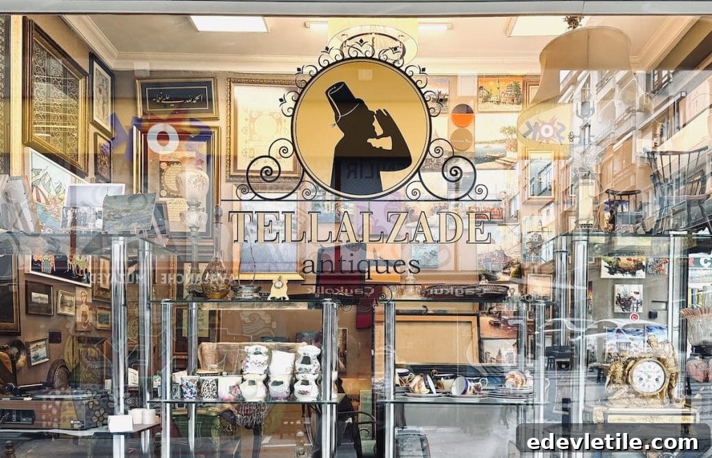 Antique shop window filled with vintage decor and artwork in a historic authentic Istanbul neighborhood.
